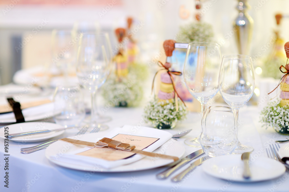 Table set for an event party or wedding reception Table set for an event party or wedding reception