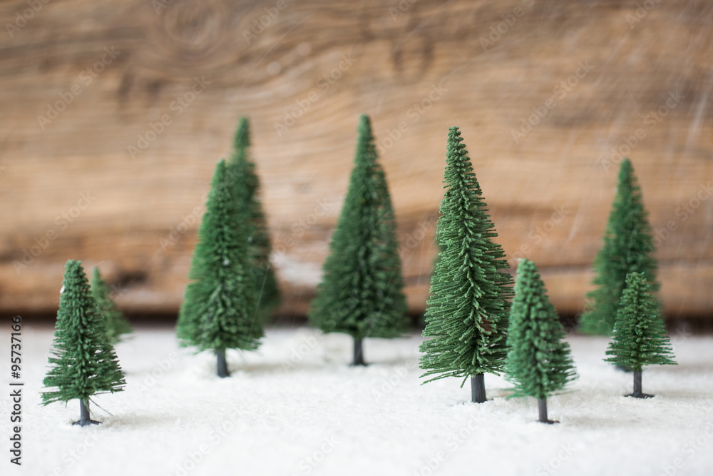 Christmas card - a miniature Christmas tree in the snow - winter