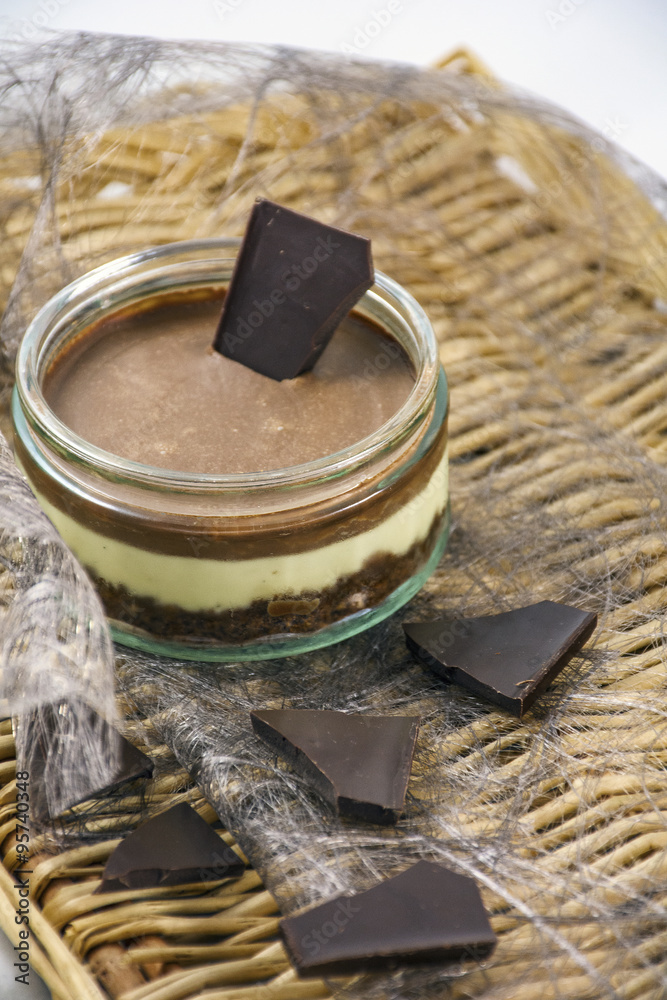 Tasty chocolate dessert on a wicker support Tasty chocolate dessert on a wicker support