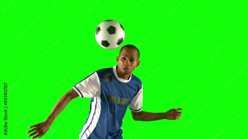 Football player heading the ball Football player heading the ball