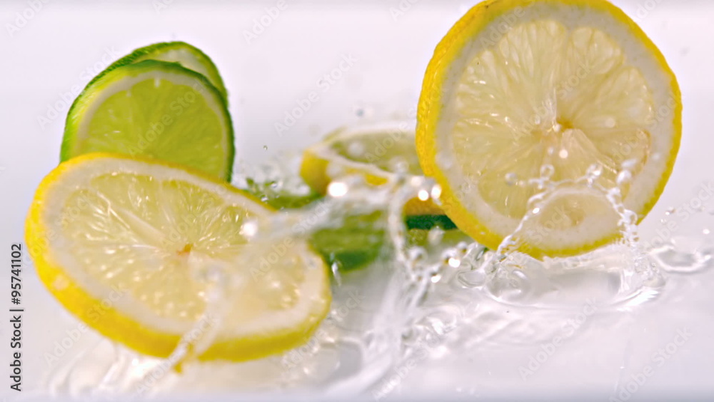 Lemon slices falling into water Lemon slices falling into water