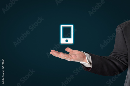 Businessman holding a virtual smart phone