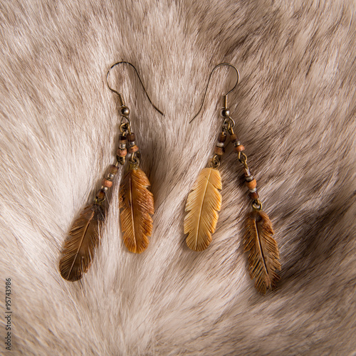 Feather Earrings on Fur