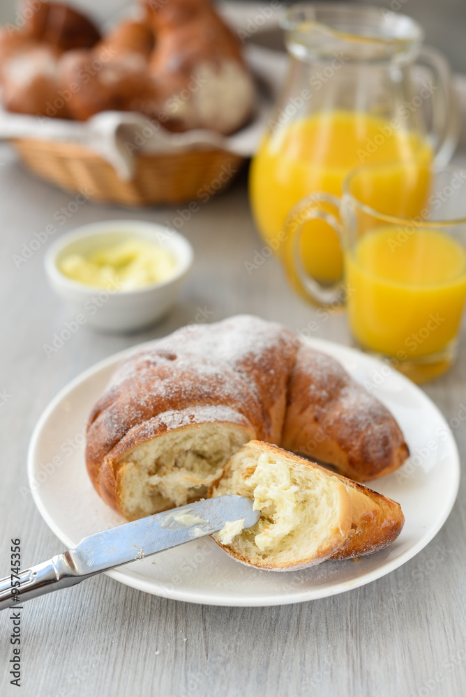 delicious breakfast with fresh croissants and orange juice delicious breakfast with fresh croissants and orange juice