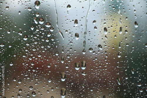 Fotografiet Rain drops on window , rainy day