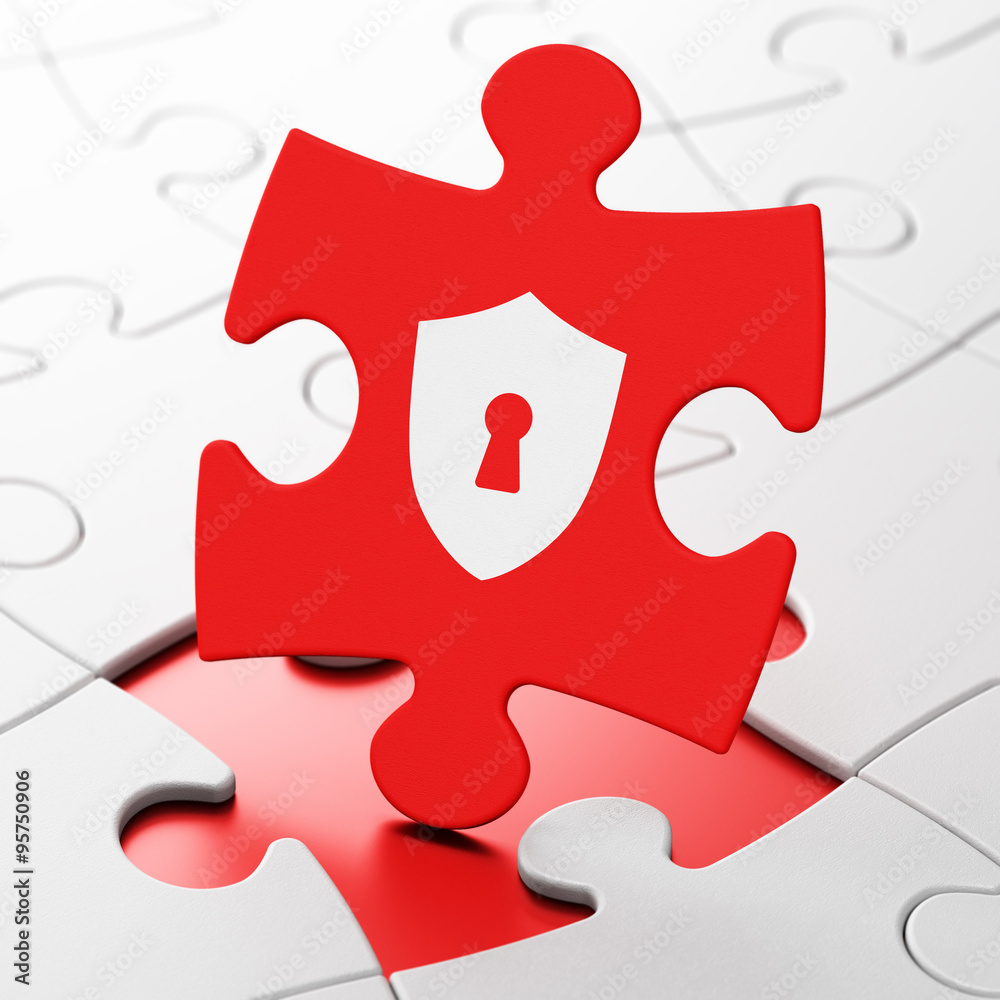 Protection concept: Shield With Keyhole on puzzle background Protection concept: Shield With Keyhole on puzzle background