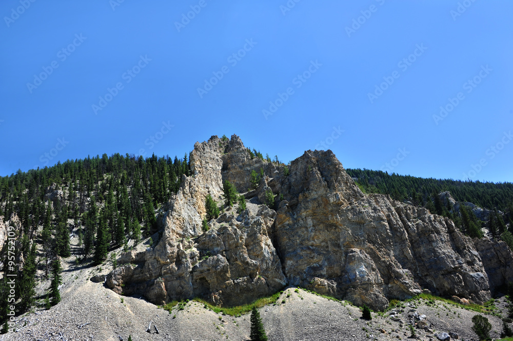 Gallatin Ridge is rugged and high. Rocky peaks reach into the Blue Sky area of Montana. Gallatin Ridge is rugged and high. Rocky peaks reach into the Blue Sky area of Montana.