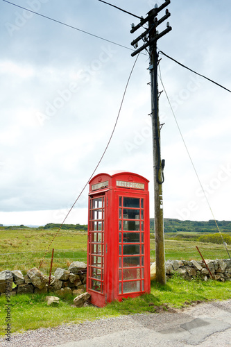 Red telephone box pole Scotland photo