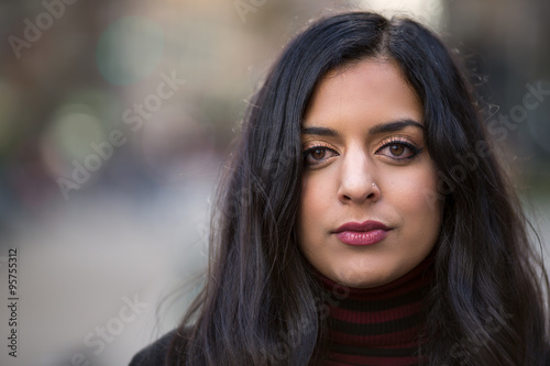 Indian woman in city serious face portrait © blvdone