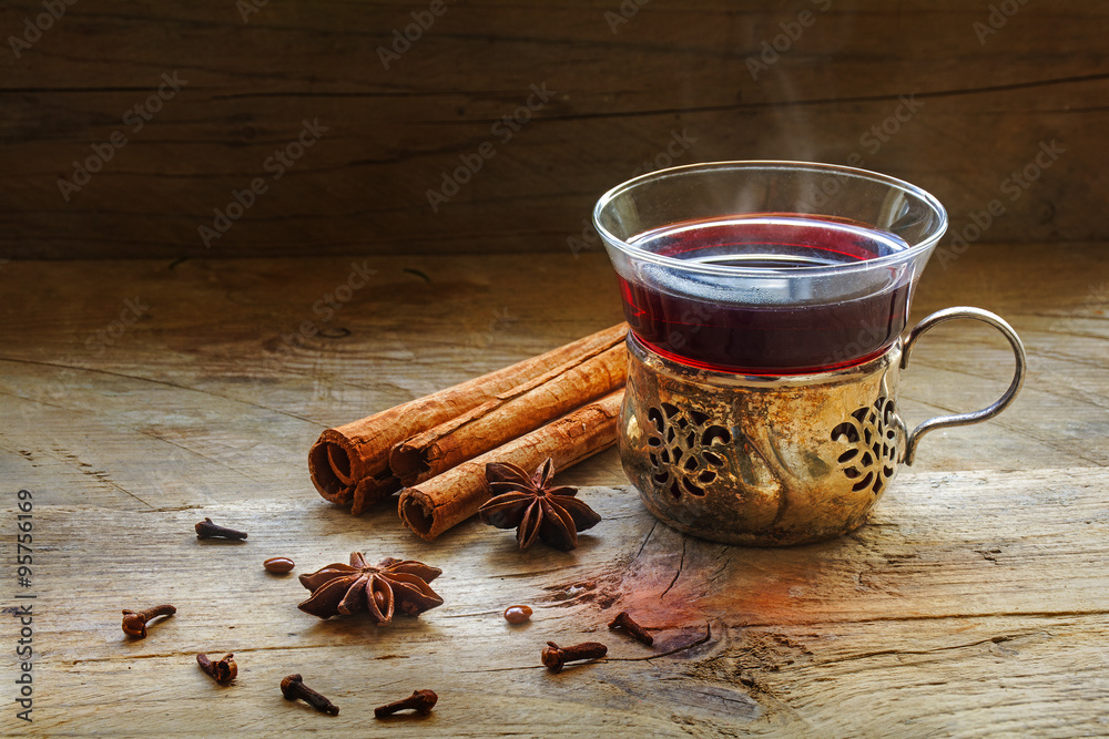 mulled wine, Christmas punch with spices on rustic wood mulled wine, Christmas punch with spices on rustic wood