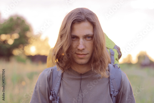 Man standing with backpack