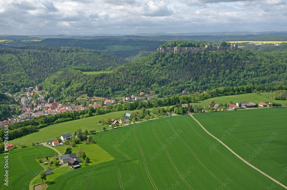 Fortress Konigstein from mesa Lilienstein in Saxon Switzerland, Germany Fortress Konigstein from mesa Lilienstein in Saxon Switzerland, Germany