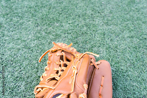 Baseball glove on the grass in a stadium © Sean K