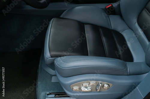 Modern leather car seat. Interior detail. © alexdemeshko