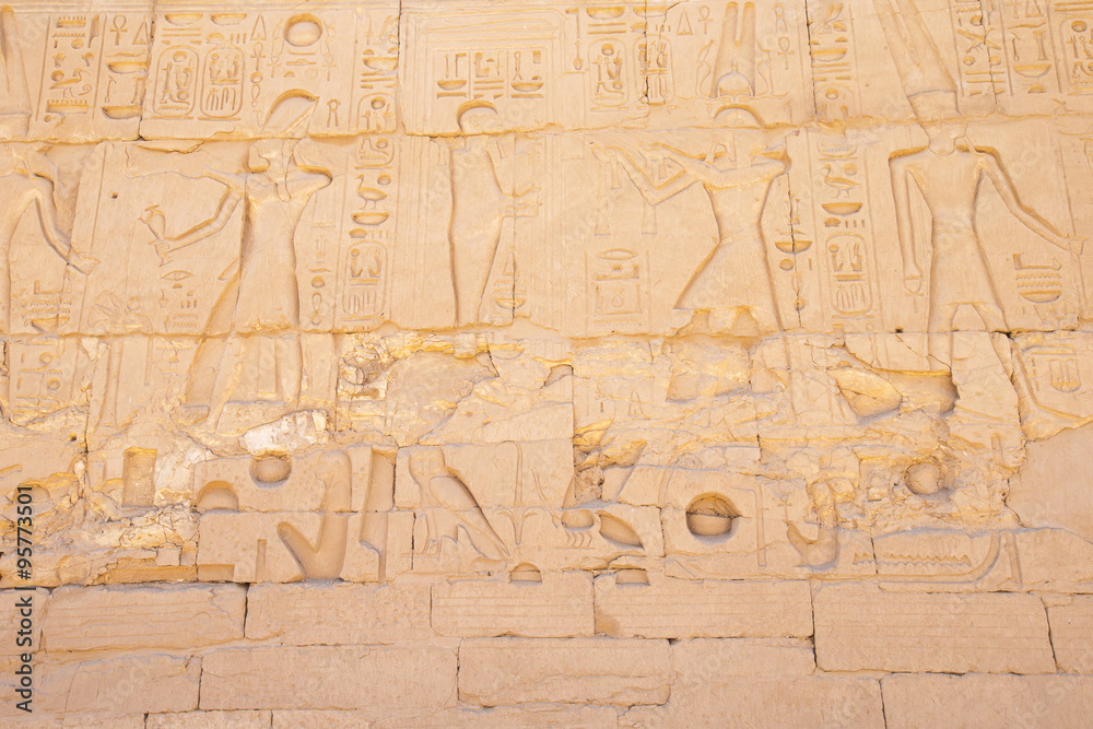 old egypt hieroglyphs carved on the stone