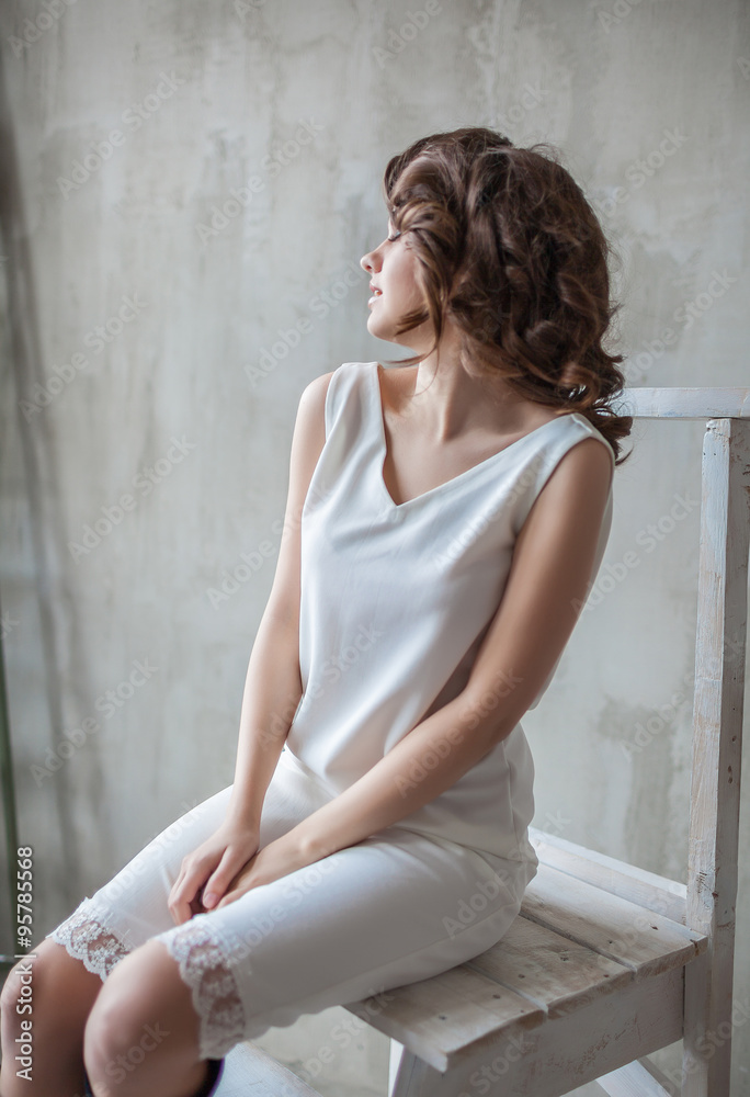 Naklejka premium Beauty woman in white dress