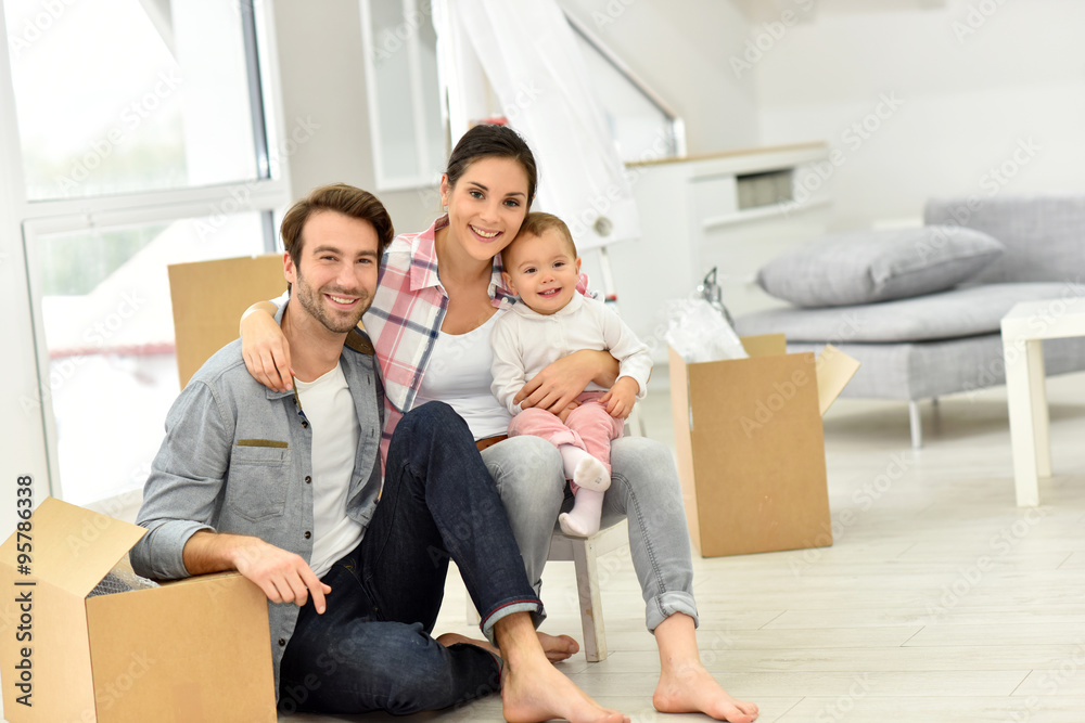 Young family moving into new home Young family moving into new home