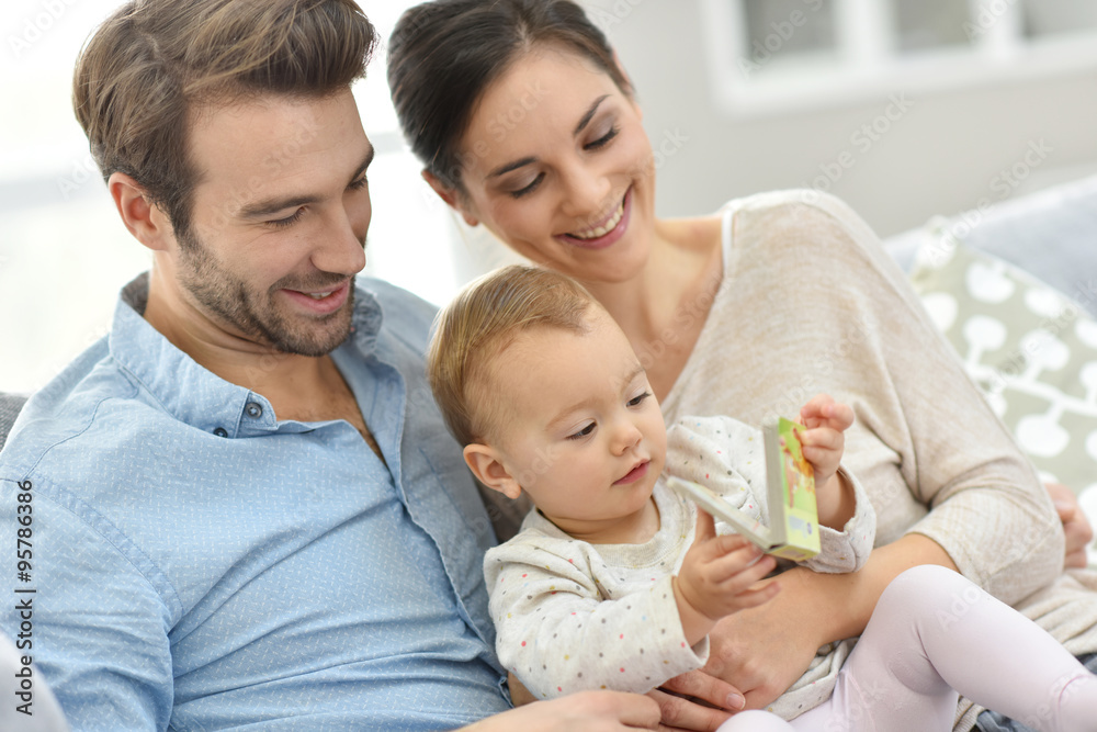 Portrait of happy young family of three Portrait of happy young family of three