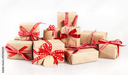 Large stack of decorative Christmas gifts photo