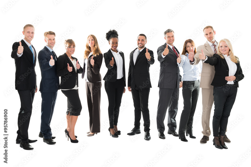 Portrait Of Business Team Showing Thumbs up