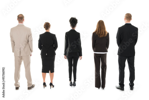 Business Team Standing Against White Background