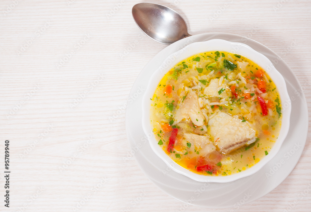 Fish soup with vegetables and rice