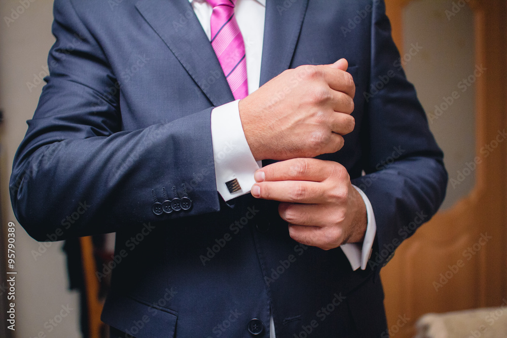 Hand with cufflink