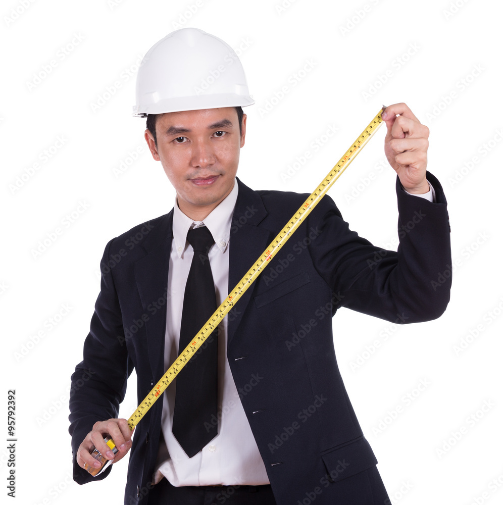engineer in a helmet with a tape measure engineer in a helmet with a tape measure