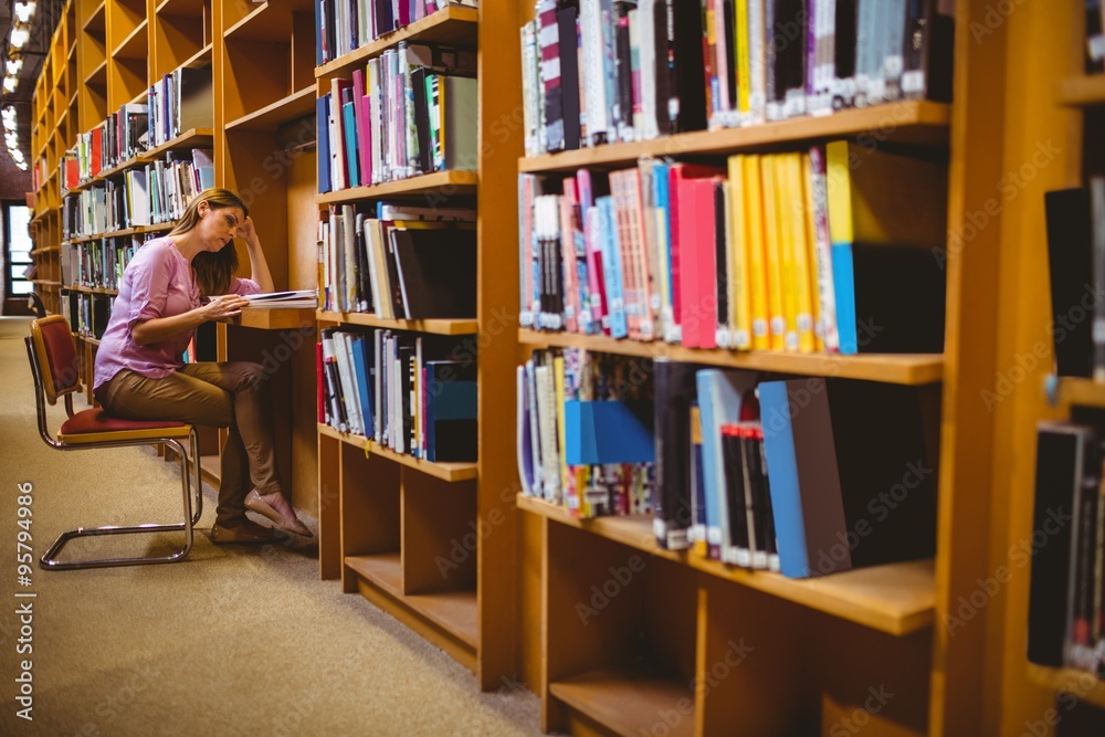 Mature student in the library Mature student in the library
