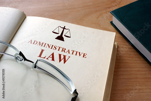 Φωτογραφία Code of   administrative law on a wooden table.