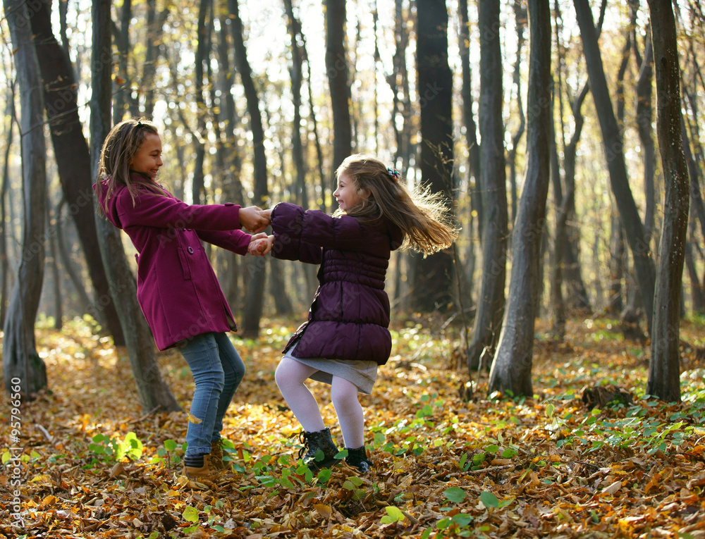 Kids playing in autumn