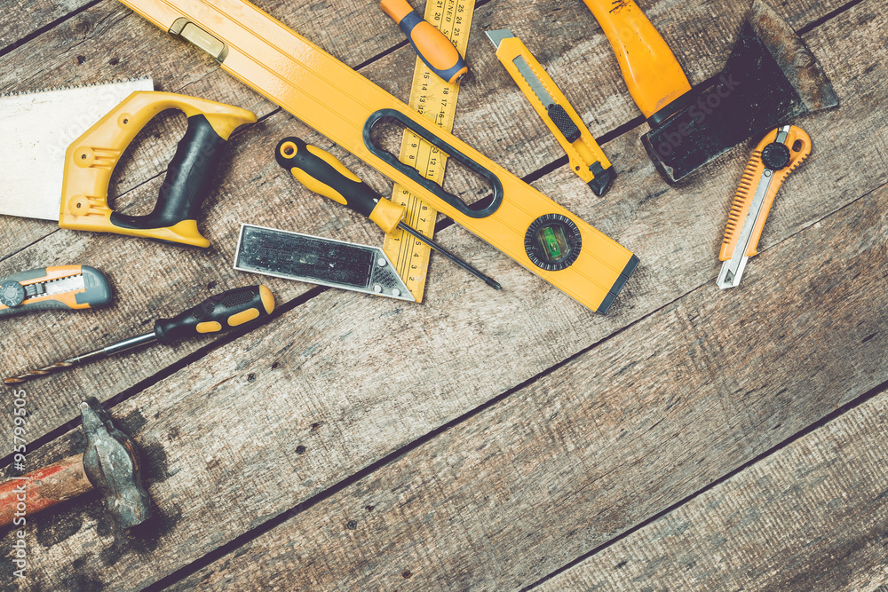 old tools on wooden background