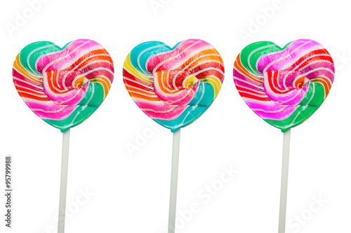 colorful heart lollipops isolated on a white background © Piman Khrutmuang