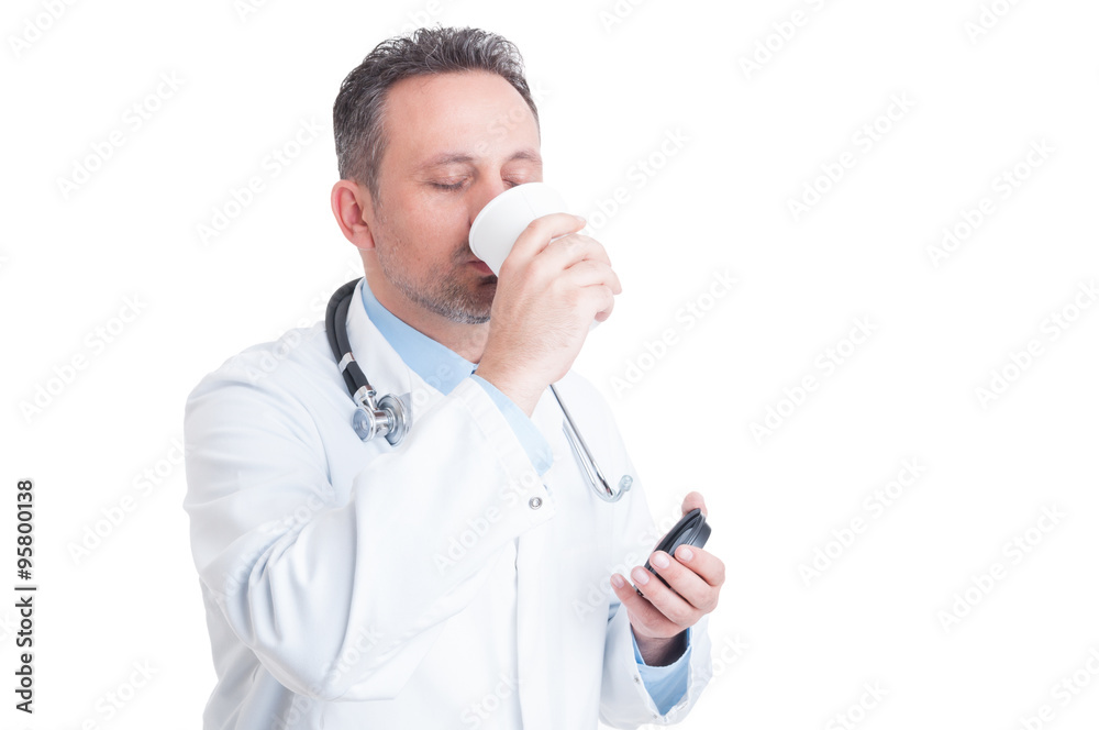 Medic or doctor drinking coffee from disposable cup Medic or doctor drinking coffee from disposable cup