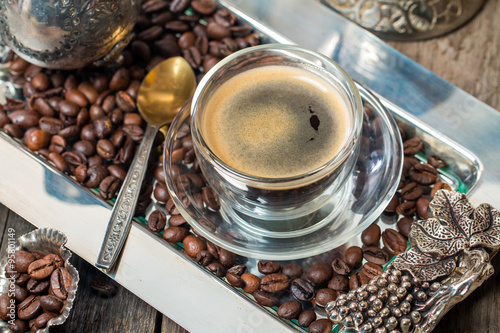 Espresso glass cup with coffee bean