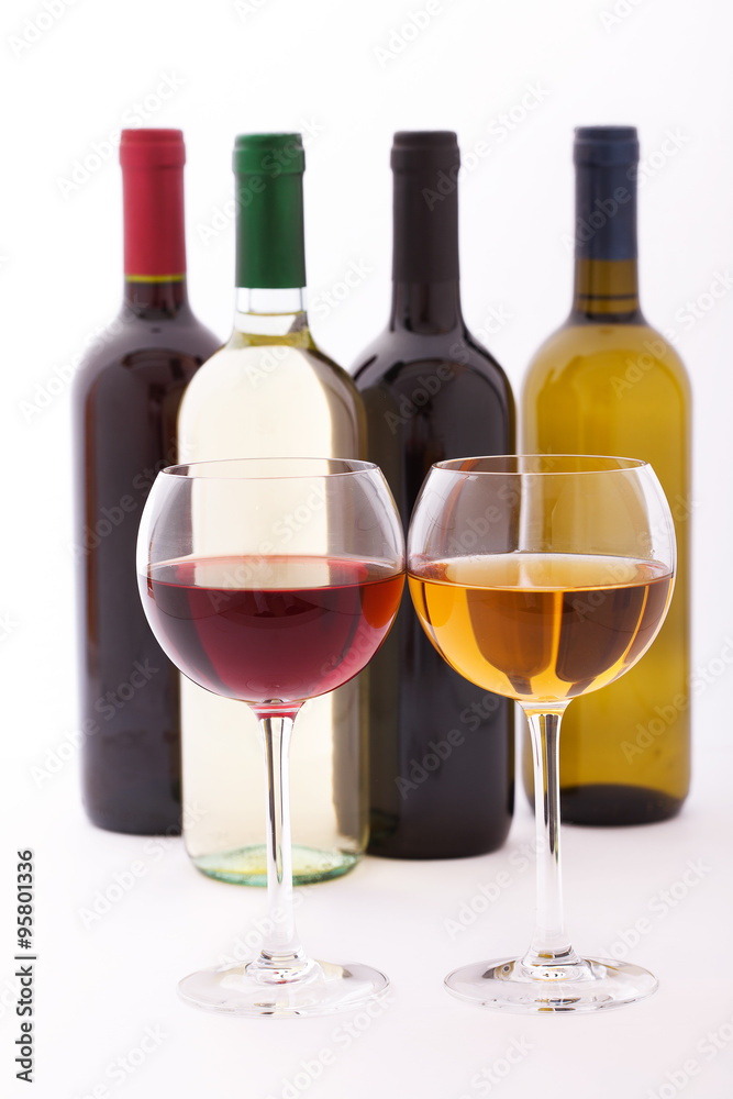 Glasses and bottles of wine unusually on white background. Glasses and bottles of wine unusually on white background.