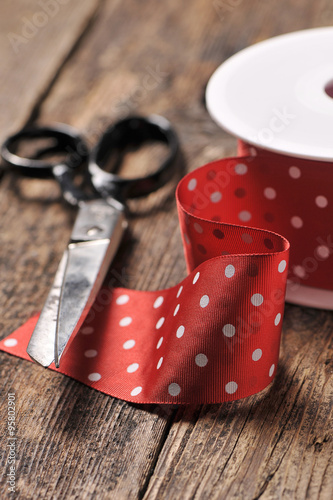 Red ribbon and scissors photo