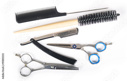 Barber or hairdresser tools on white background