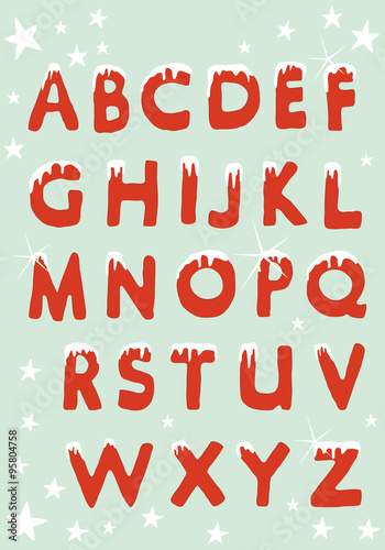 Set of christmas capital letters hung with snow