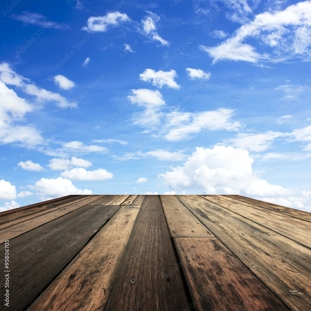wooden way on blue sky background