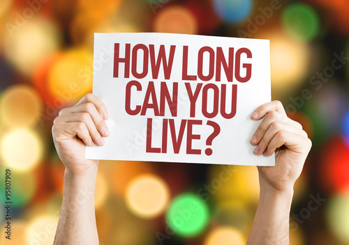 How Long Can You Live? placard with bokeh background