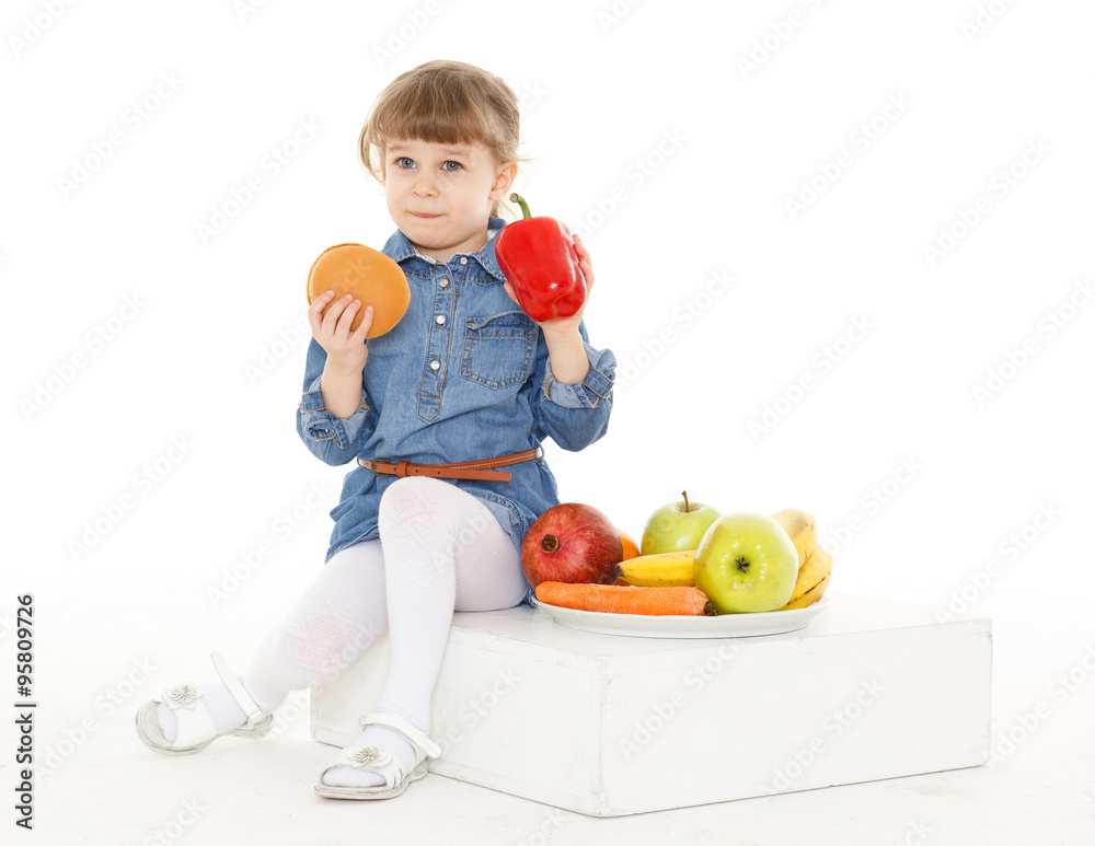 Child with hamburger and fruits. Child with hamburger and fruits.