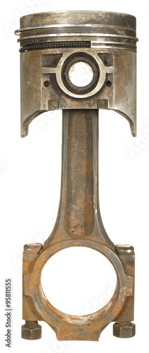 The old rusty piston with a rod isolated on a white background