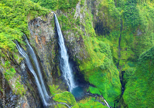 Aerial view to waterfall in rainforest. Cirque Salazie, Reunion Island.