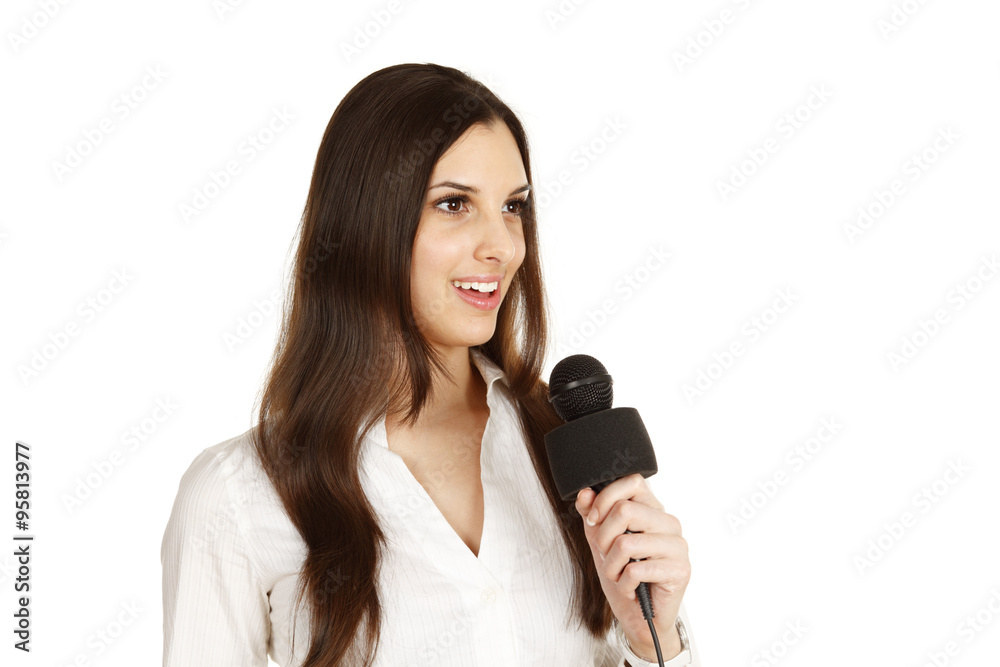 A young woman with a microphone looking A young woman with a microphone looking