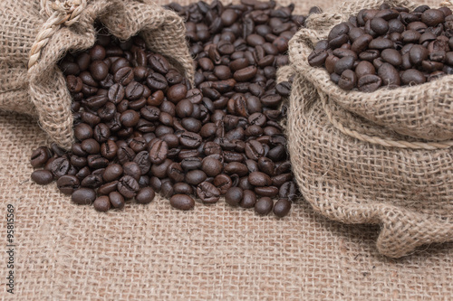 Coffee beans roasted in sack © nuruddean