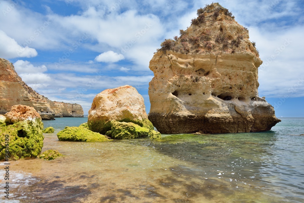 beach and rocks at Atlantic ocean coast in the Algarve