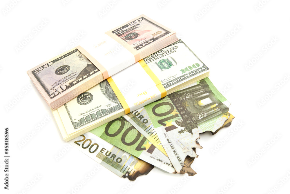 dollars and burned euros on white dollars and burned euros on white