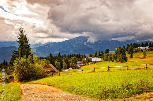 Fototapeta Naklejka Na Ścianę i Meble -  View on the High Tatra Mountains with dark clouds at background.