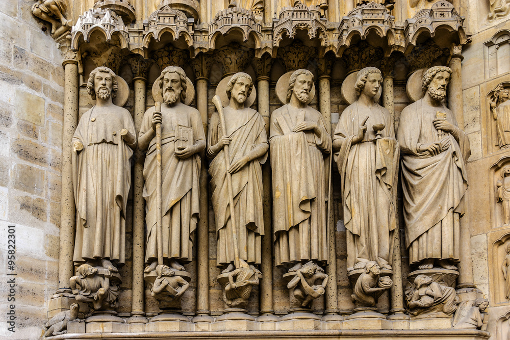 Sculptures at main entrance to cathedral Notre Dame de Paris.